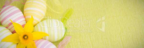 Yellow flower and easter eggs