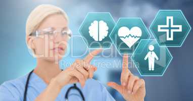 Female doctor interacting with medical hexagon interface