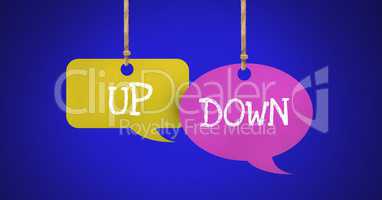 Up Down text on hanging paper speech bubbles