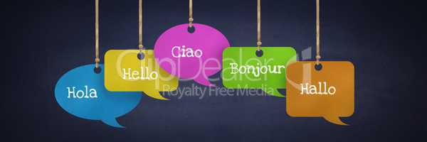 Different Languages text on hanging paper speech bubbles