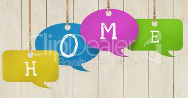 Home text on hanging paper speech bubbles