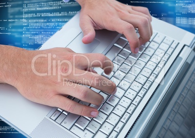 Hands typing coding text