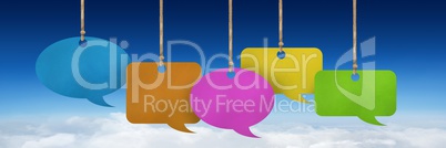 Hanging paper speech bubbles and sky background