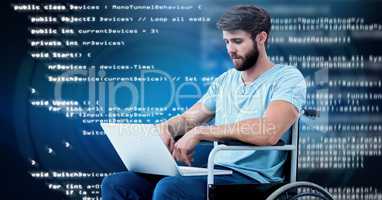 Disabled man typing coding text  in wheelchair
