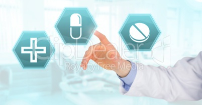 Doctor hand interacting with medical hexagon interface