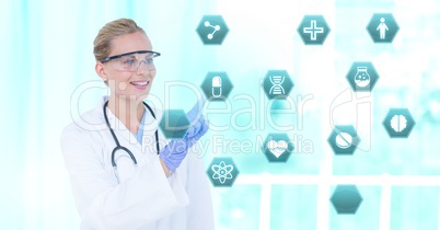 Female doctor interacting with medical hexagon interface