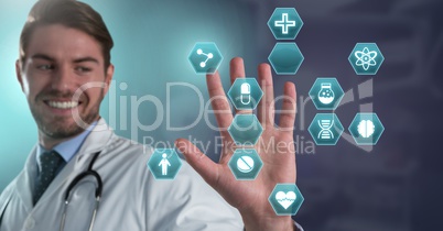 Male doctor interacting with medical hexagon interface