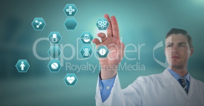 Male doctor interacting with medical hexagon interface