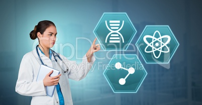 Female doctor interacting with medical hexagon interface