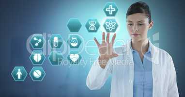 Female doctor interacting with medical hexagon interface