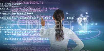 Composite image of female executive pressing an invisible virtual screen