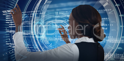 Composite image of side view of businesswoman using interface