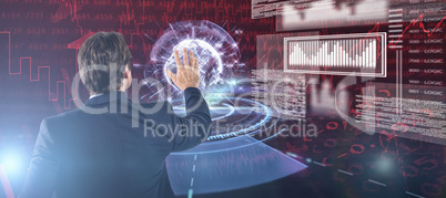 Composite image of businessman touching the invisible screen