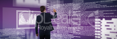 Composite image of businessman pressing an invisible virtual screen