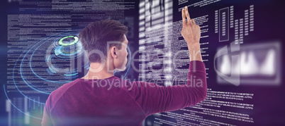 Composite image of rear view of businessman using invisible interface screen