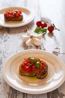 Italian bruschetta with tomato and basil