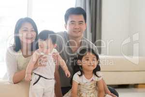 Portait of happy Asian family