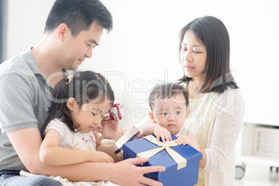 Happy Asian Family and present