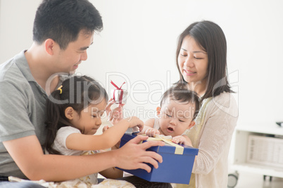 Happy Asian Family and gift box