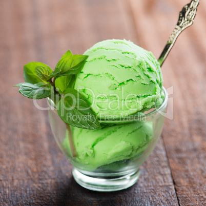 pistachio ice cream in cup close up