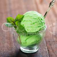pistachio ice cream in cup close up