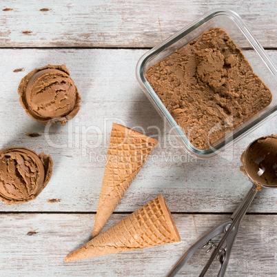 Top view cocoa ice cream scoops
