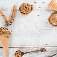 Chocolate ice cream top view with space