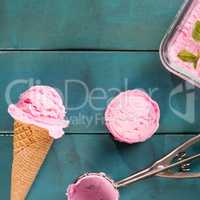 Pink ice cream in blue background