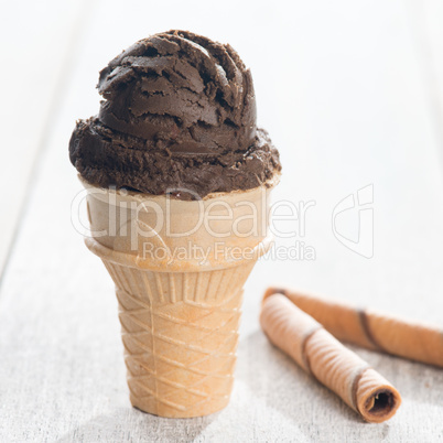 Chocolate ice cream in waffle cone