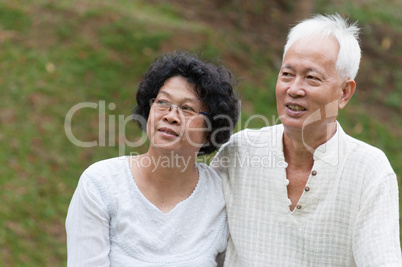 Mature Asian couple outdoor.