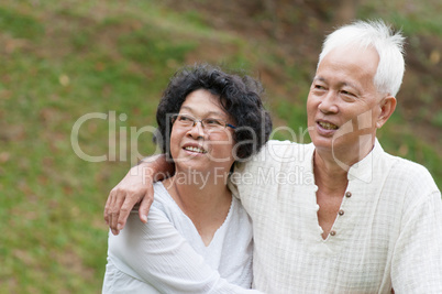 Old Asian couple outdoor.
