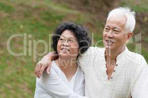 Old Asian couple outdoor.