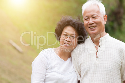 Happy old Asian couple.