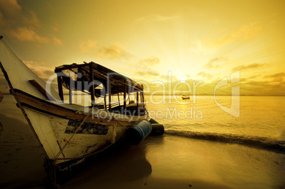 Fishing boat in sunset