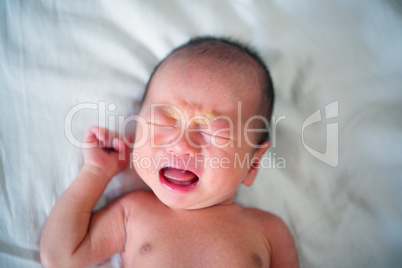 New born baby boy crying