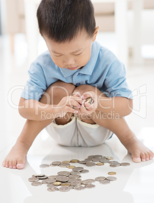 Child saving coins