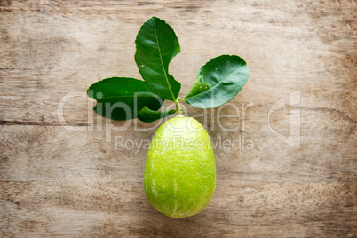 Fresh organic green lemon top view