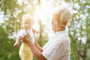 Grandparent and grandchild portrait.