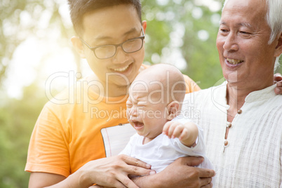 Grandfather, father and grandson.