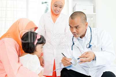 Children consulting doctor