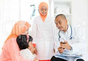 Muslim family consulting doctor