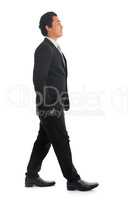 Side view Asian businesspeople walking