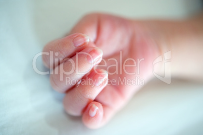 Newborn baby hand close up