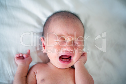 Asian new born baby boy crying
