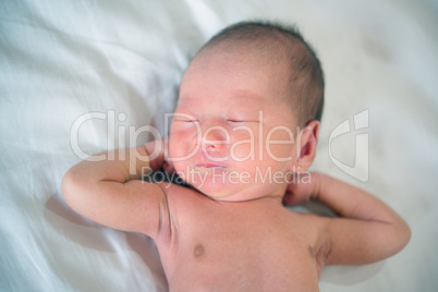 Newborn baby stretches