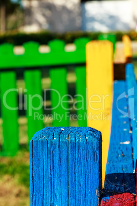 Blue wooden post close up.