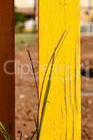 Yellow fence post.