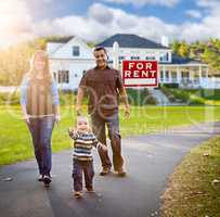 Happy Mixed Race Family Walking in Front of Home and For Rent Re