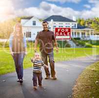 Happy Mixed Race Family Walking in Front of Home and For Sale Re