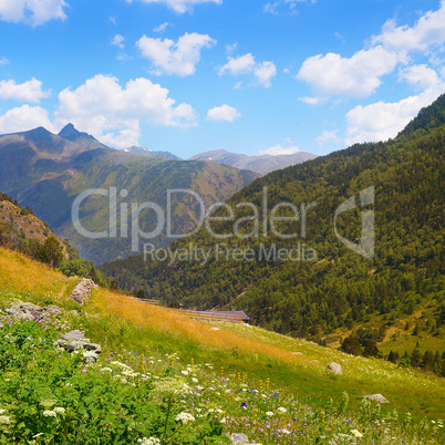 Mountain landscape,meadow, hiking trail and beautiful sky.